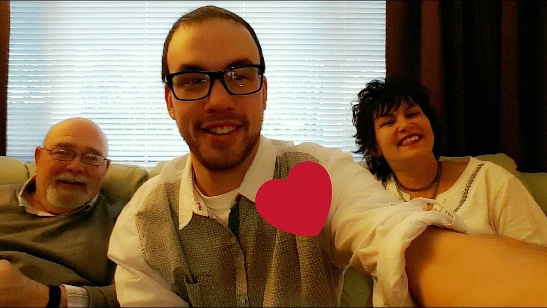 Selfie on the couch with a heart sticker